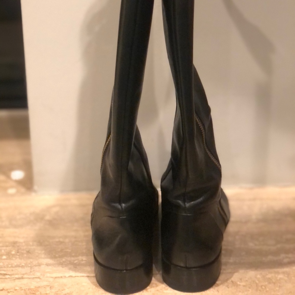 Tall black boots